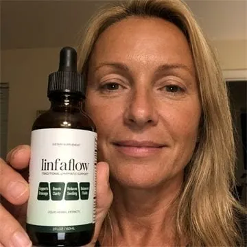 Linfaflow customer photo 3 — a verified buyer holding the 2 fl oz dropper bottle